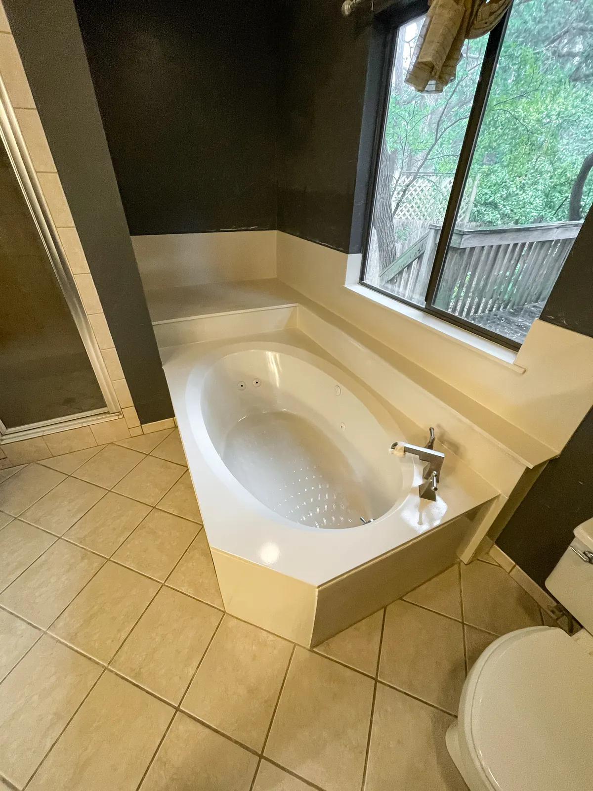 Cultured marble tub repaired and refinished in white