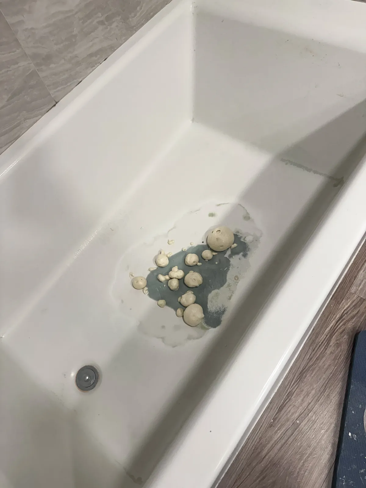 Worn fiberglass tub floor filled and built back up