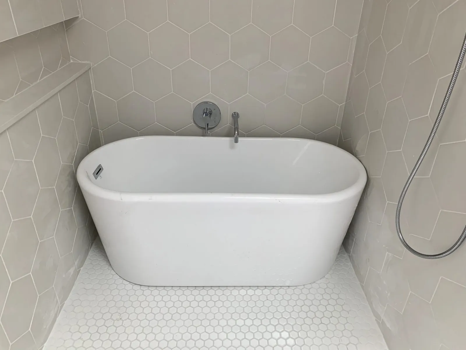 Same freestanding tub repaired and refinished, installed, after