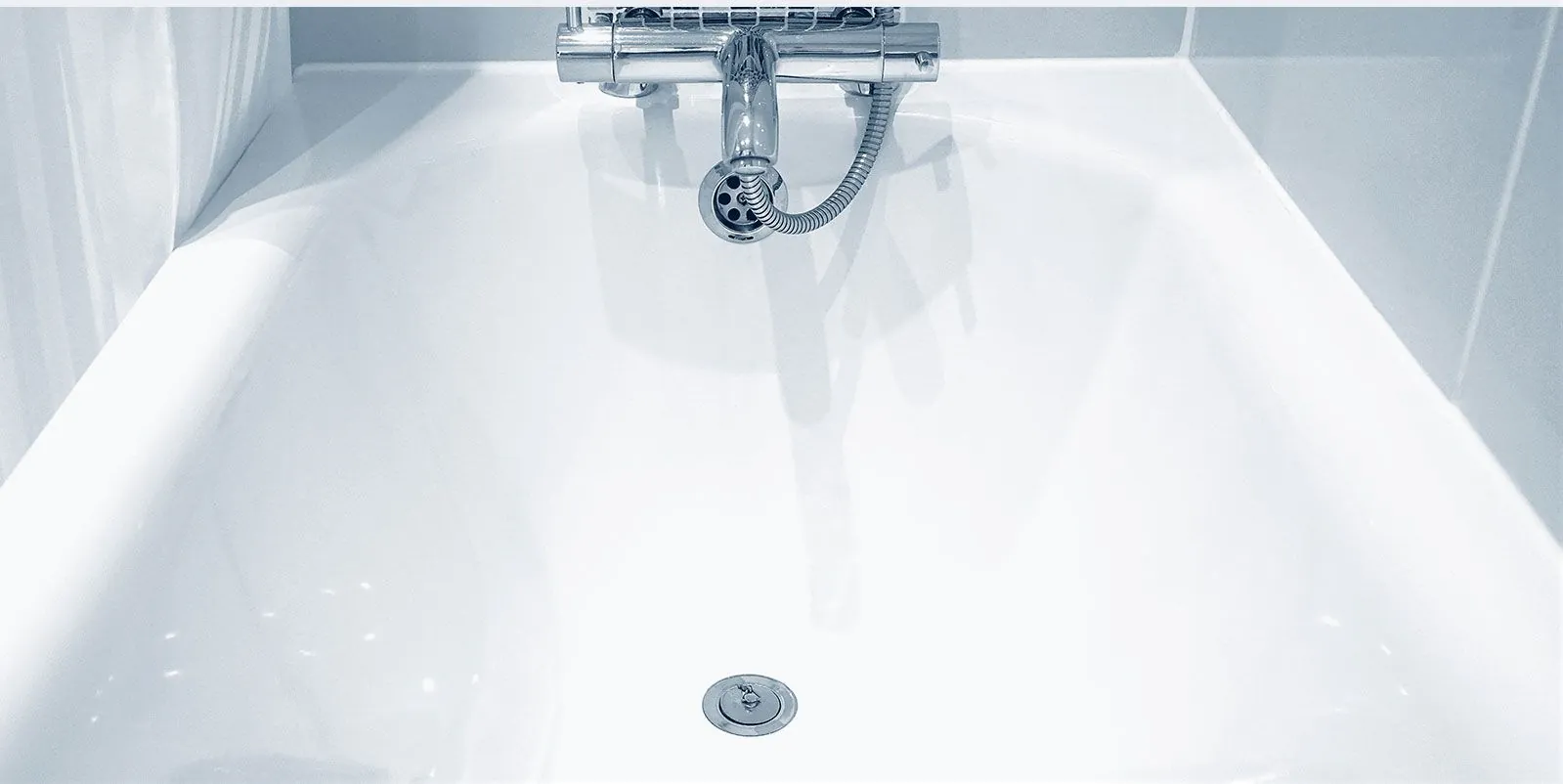 Close-up of a freshly refinished bathtub surface