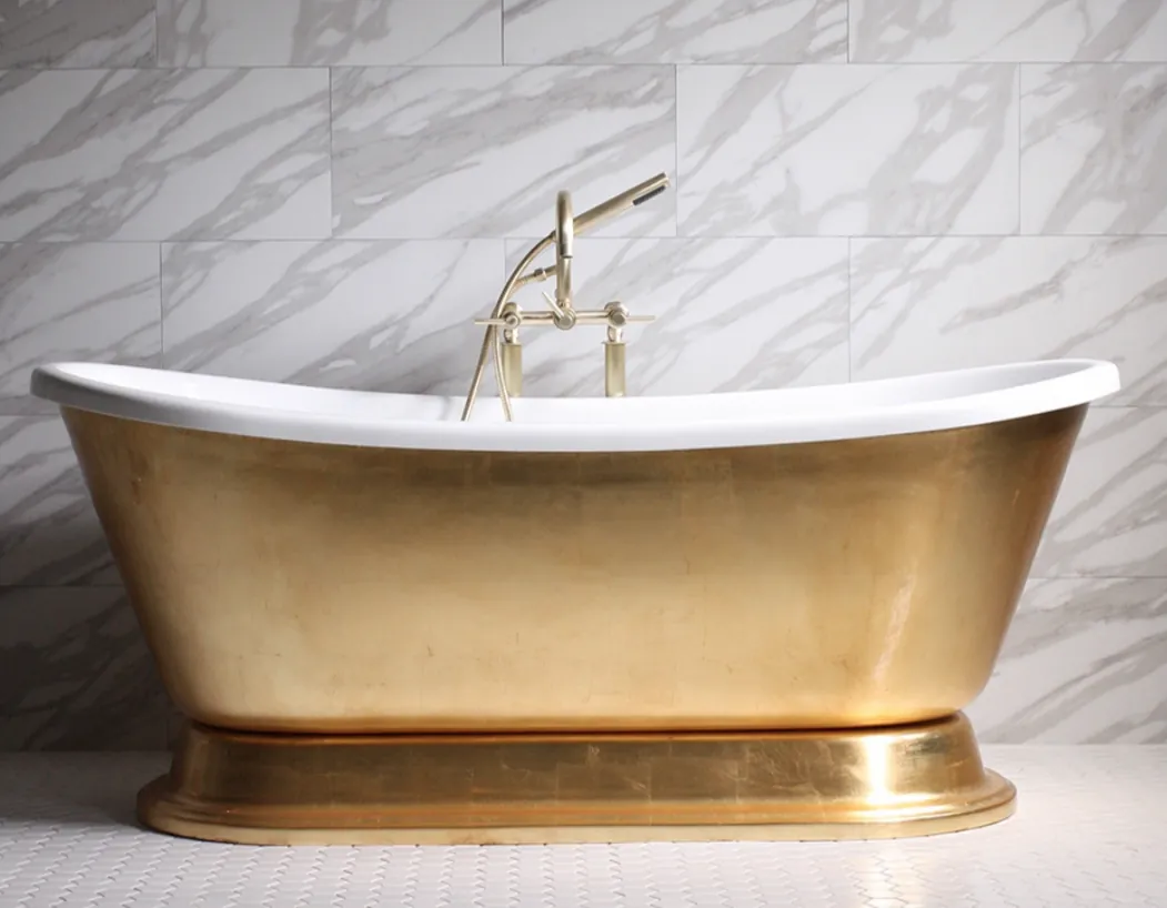 Reference photo the customer sent: a gold slipper tub against marble