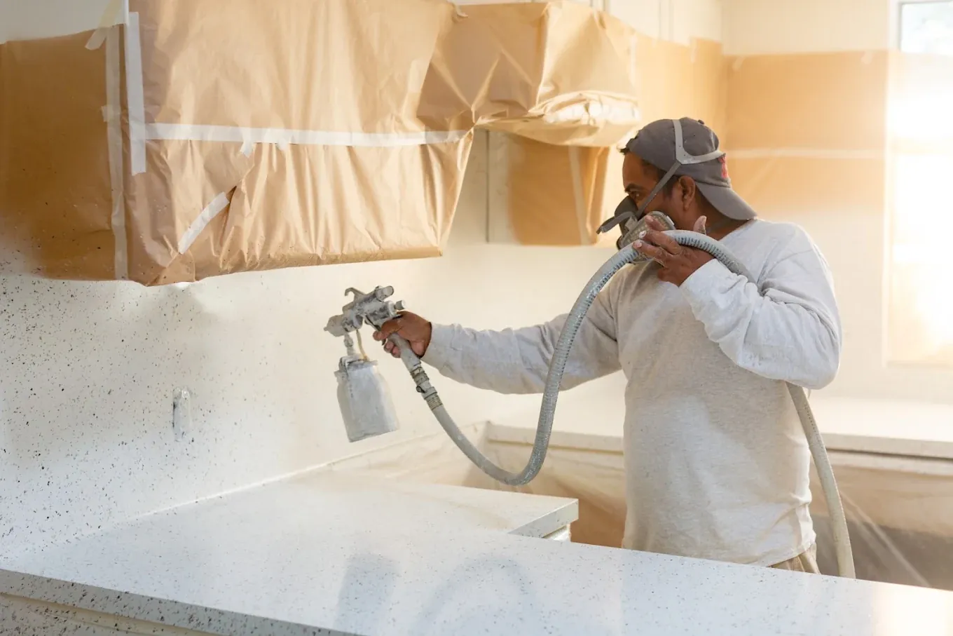 Advanced Refinish technician spraying the finish coat